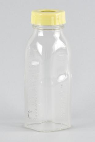 portion of glass baby bottle