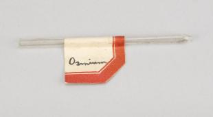 osmium dust in open-ended glass tube