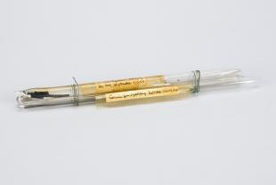 praseodymium, cerium, unidentified sample in three sealed glass tubes