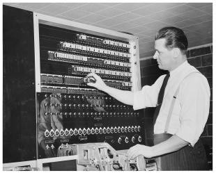 IBM ASCC-Mark I photo album: engineer installing a relay