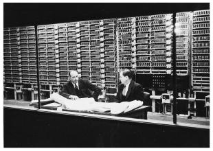 IBM ASCC-Mark I photo album: Durfee (left), engineer (right), Mark I schematics