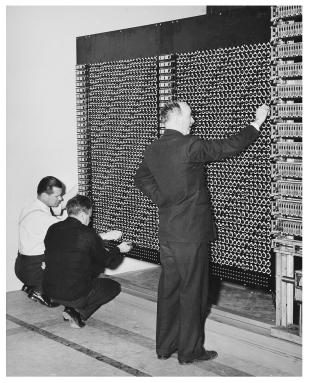 IBM ASCC-Mark I photo album: Durfee (right), engineers, inputting constants
