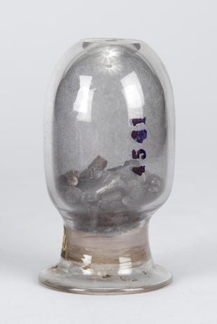 glass container of graphite pellets