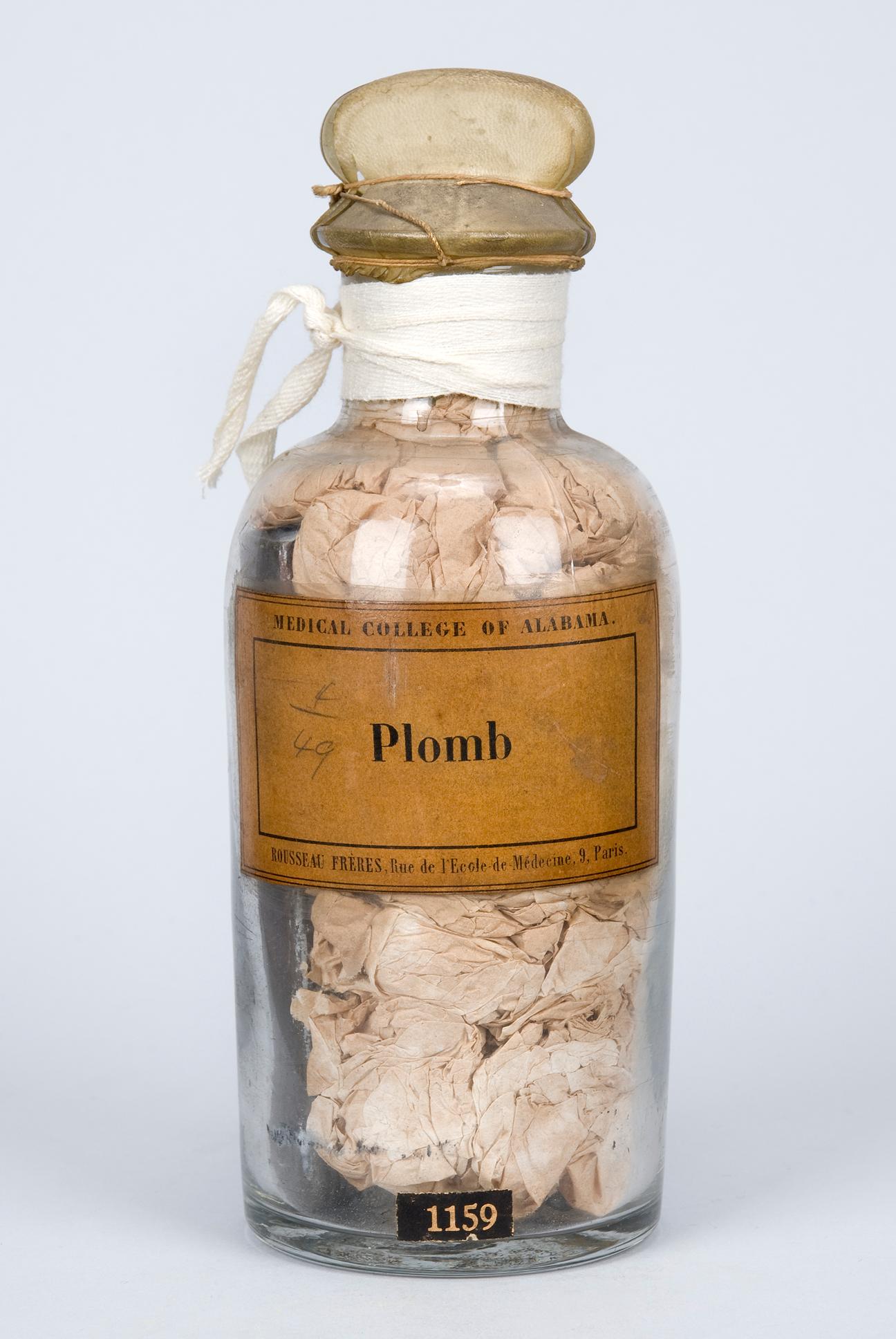 stoppered glass bottle of Plomb, Objects