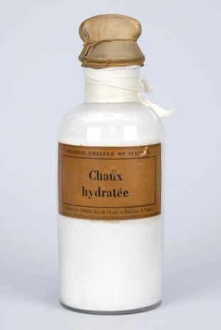 stoppered glass bottle of "Chaux Hydratée"