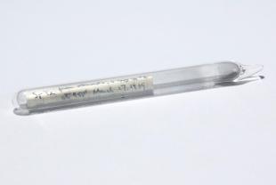 strontium-tellurium alloy dust in a sealed glass tube
