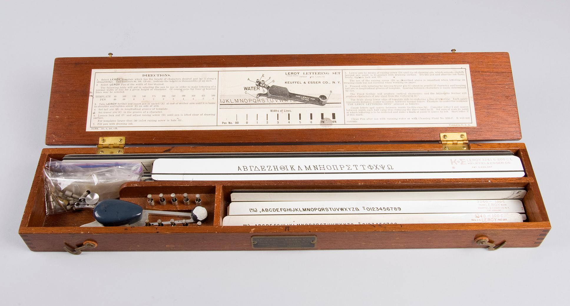 Leroy Lettering Set by Keuffel & Esser Co, containing eight stencils/rules  in box, 40cm wide.