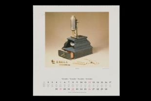 calendar page showing a compound microscope